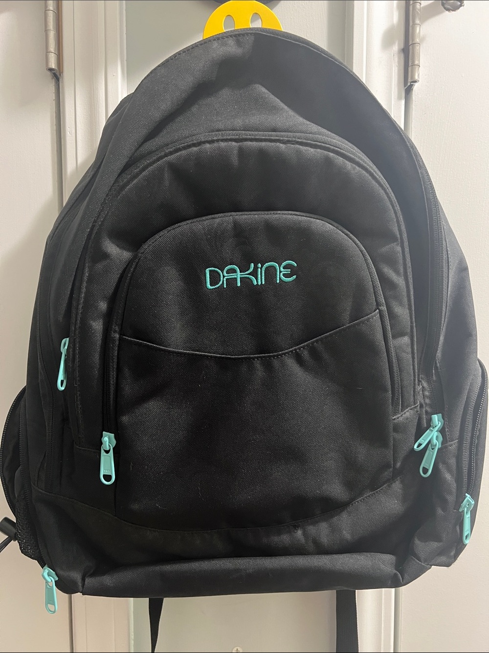 Dakine Black Backpack with Teal Accents